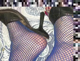 Fucking me with different toys, showing my tits, cock and pierced nails while wearing fishnet stockings and tying my balls and cock.