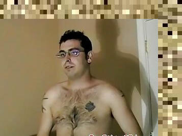 Nerdy amateur with glasses strips to jerk off until he cums