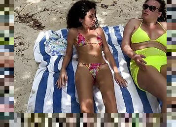 The pervert cummed on the girls while they were sunbathing on a public beach