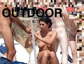 Nudist girl enjoys her summer nude outdoors