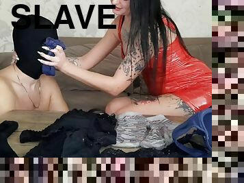 Smell fetish. Dominatrix Nika makes her slave sniff her bras, panties, socks and stockings