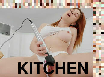Redhead babe Molly Stewart masturbates in the kitchen