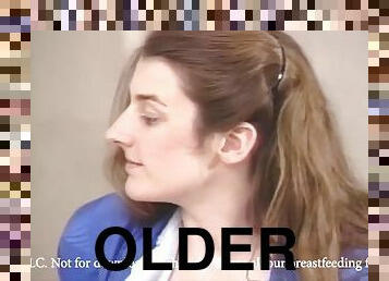 Older woman helps younger woman milk her saggy boobs