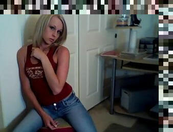 Blonde chick in jeans and pink panties teases