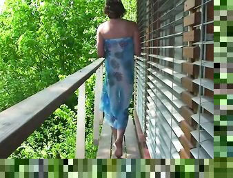 Mature shows her tits and plays with herself