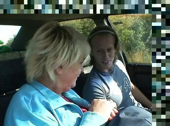 very hot blonde gilf gives sloppy head in the car