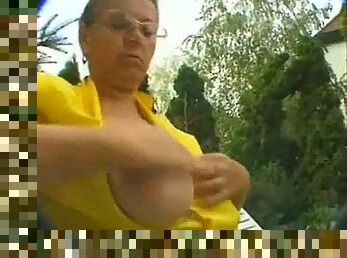 Hairy Granny Masturbates in the Garden