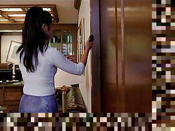 Kelly Hu in skintight snakeskin vinyl pants