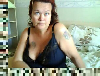 Female playing with G-Spot Dildo in bedroom