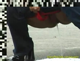 Young girls peeing in public