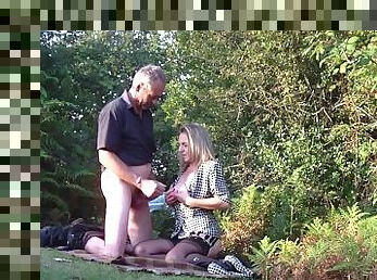 Amateur MILF sucking mature strangers in forest. Dogging