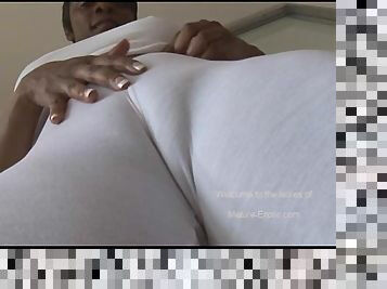 Busty mature ebony babe in tight spandex cameltoe tease