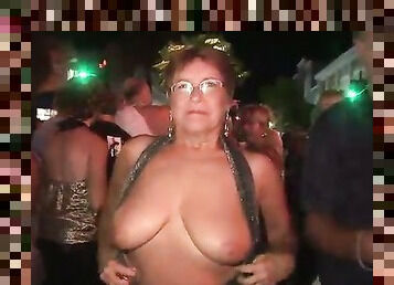 These mature women love to flash in public and they've got big natural tits