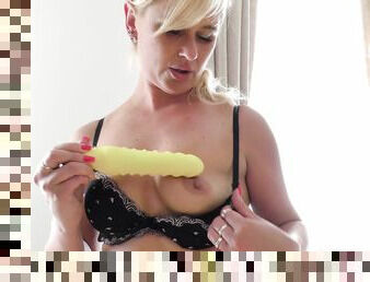 Adorable babe using her toy to please herself