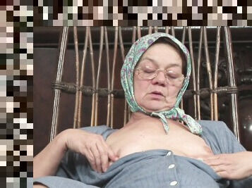 Perverted fat wrinkled granny flashes her mature pussy during solo