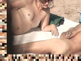 Spying a couple at the beach